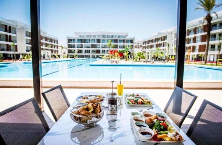 คอร์ตยาร์ด ลอง บีช ฮอลิเดย์ รีสอร์ต Aparthotel Iskele District  ภายนอก รูปภาพ